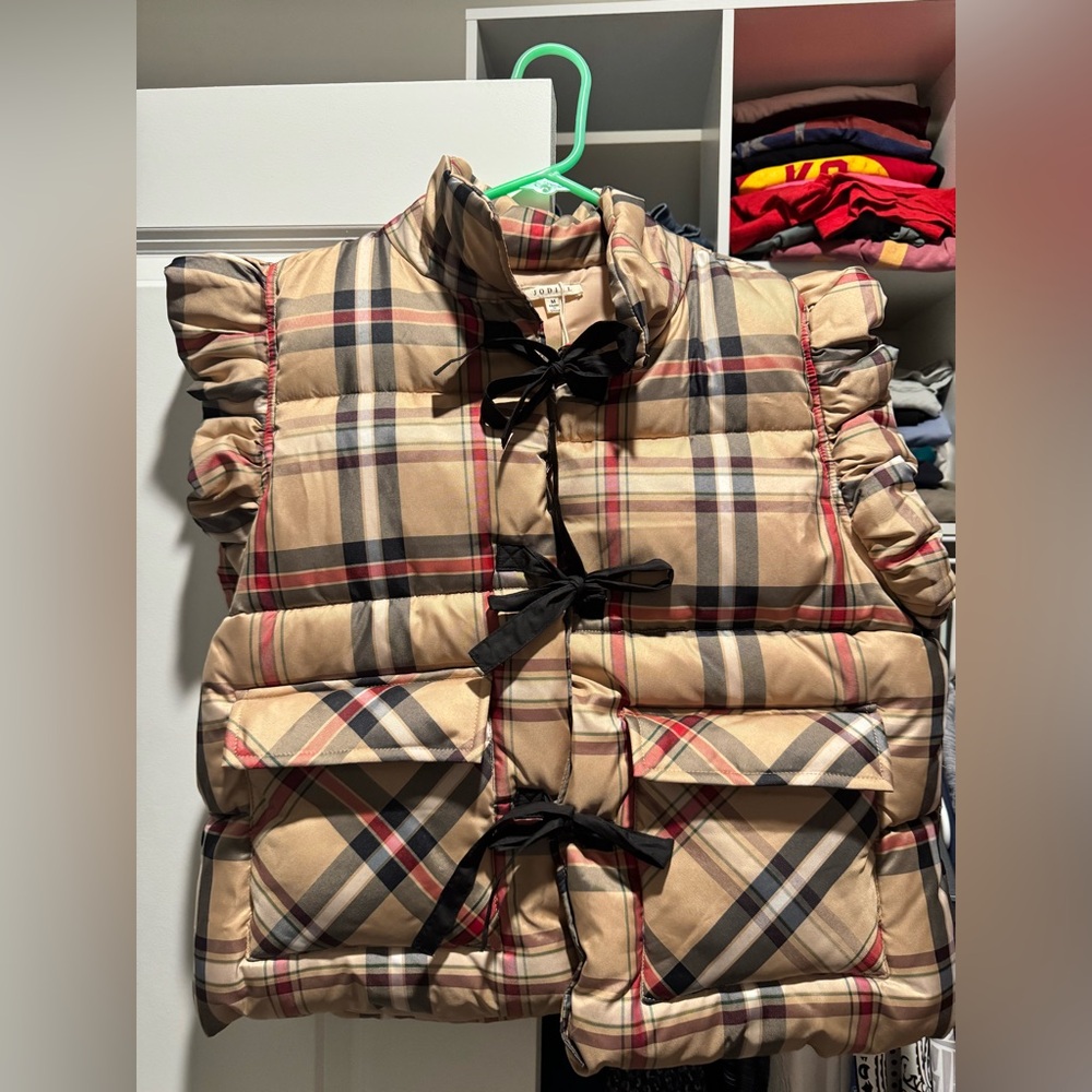 Brand new bow front puffy vest